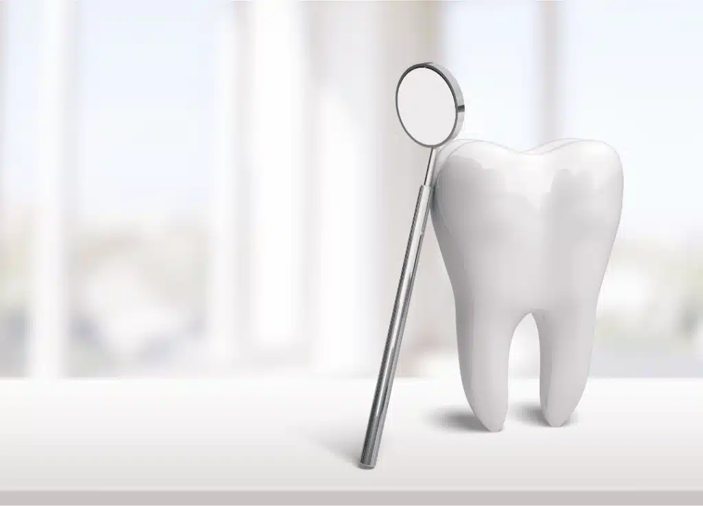 A clean white tooth with a dental mirror, representing modern dental practice growth and patient care systems.