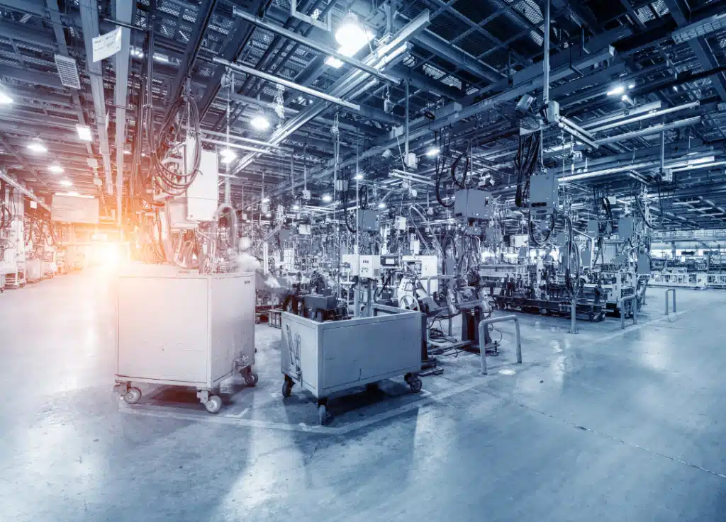 Modern automated manufacturing facility with industrial machinery and assembly lines, representing Strativera’s expertise in optimizing operations and driving manufacturing growth.
